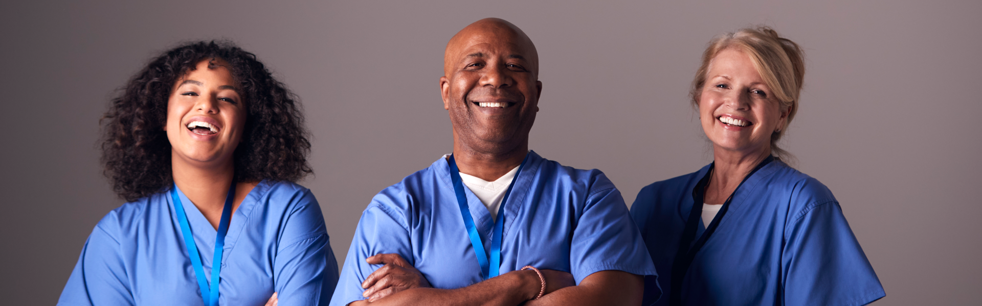 three caregivers smiling